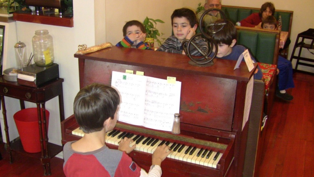 Rhode Island Reds hosted live music of all kinds, including this piano recital by students of local teacher Judith Malionek on Jan. 1, 2011. Photo courtesy Chris Currie.