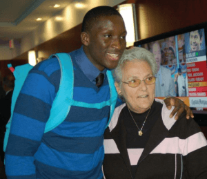 Victor Oladipo, certain to be a first-round NBA draft pick this month, will be the first St. Jerome alum to play  professional basketball. He reunited with his middle-school teacher, Janice Volpini, at a May reception in his  honor hosted by his high school alma mater, DeMatha. Photo by Mike Murray.