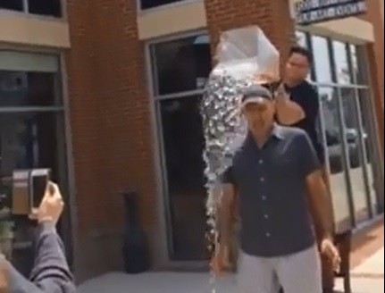 Busboys and Poets owner completes ALS ice bucket challenge