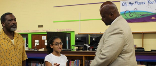 New Hyattsville Middle School Principal Thornton Boone speaks with the SGA president at the July 30 community Meet and Greet. Photo courtesy Caroline Selle.