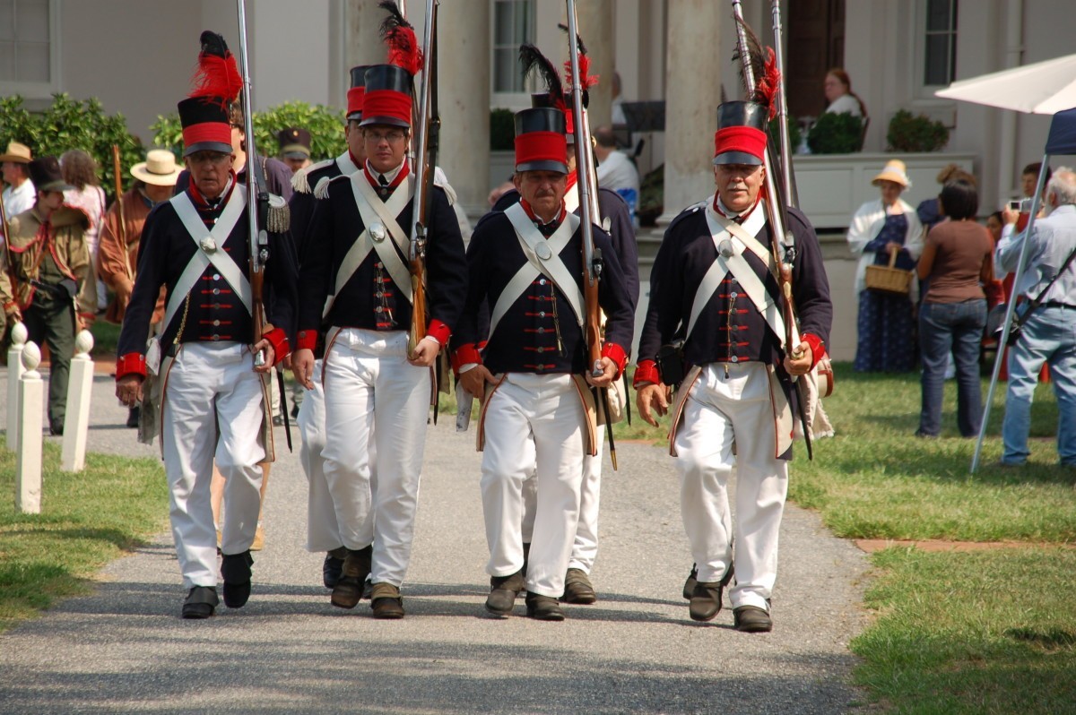 Members of the Baltimore United Volunteers march in formation in front of Riversdale.