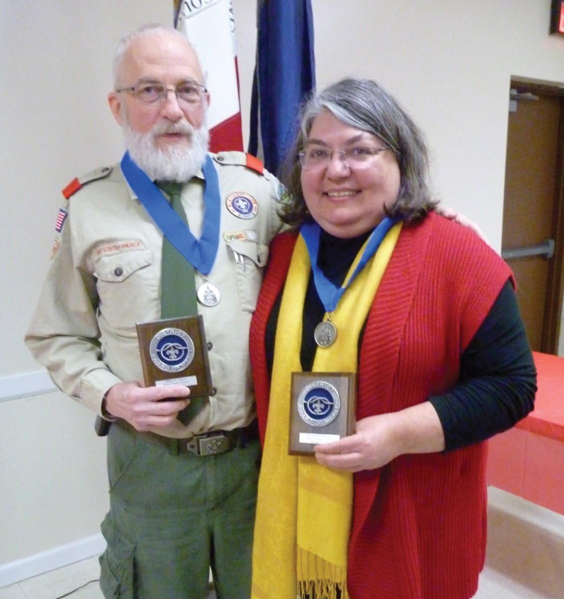 Troop 224 Scoutmaster Bill Thomas and his wife, Dr. Cathleen Hapeman, were awarded the Prince George’s Scouting District Award of Merit on February 8. Since he became scoutmaster in 2001, the number of Eagle Scouts from the troop has skyrocketed. Credit: Colleen Aistis 