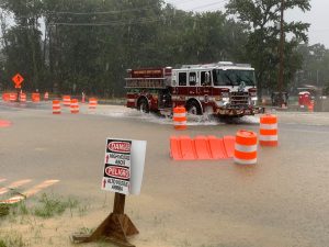 firetruck going through September flood waters