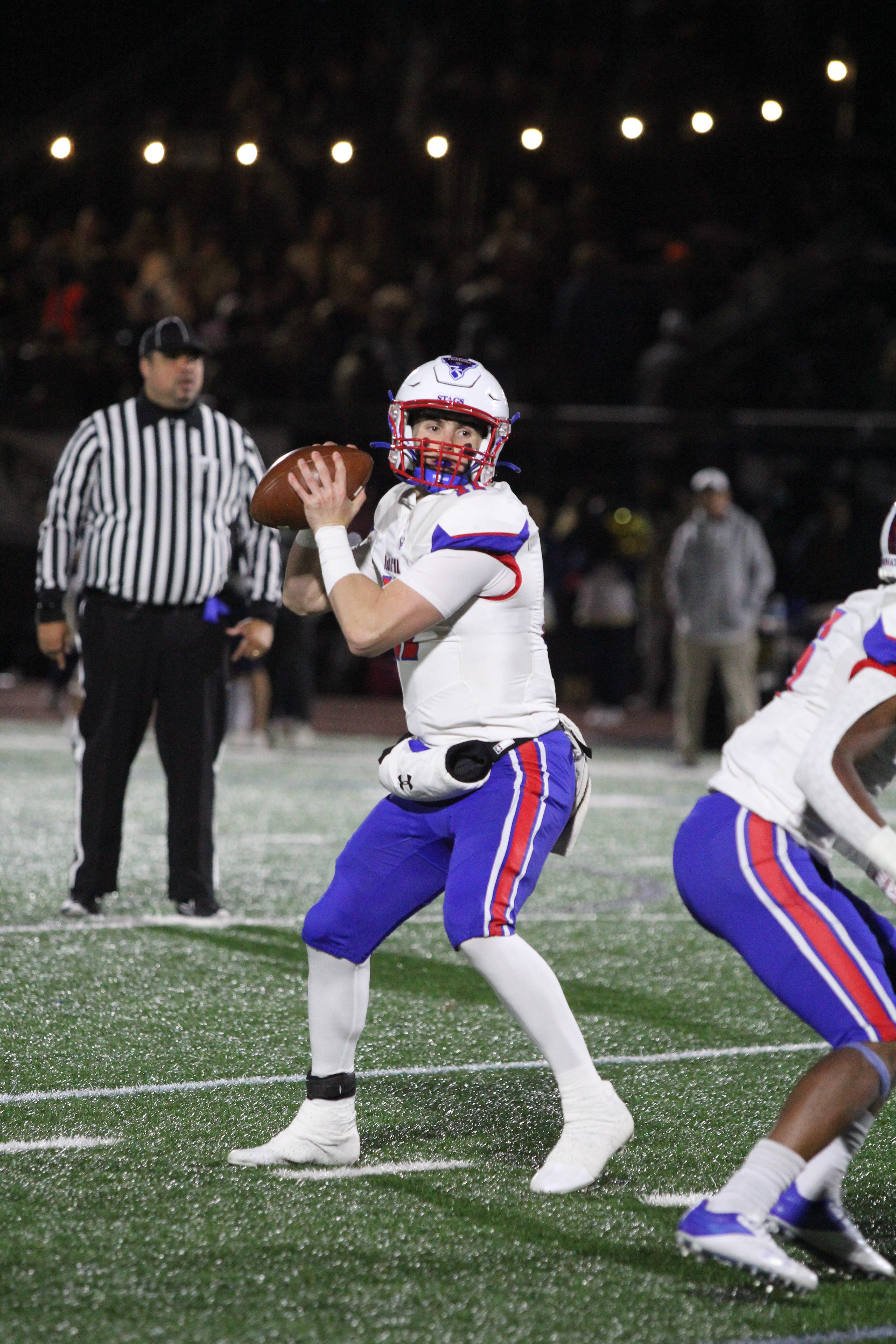 Quarterback’s unlikely return from injury helps lead DeMatha to victory; playoffs start this week
