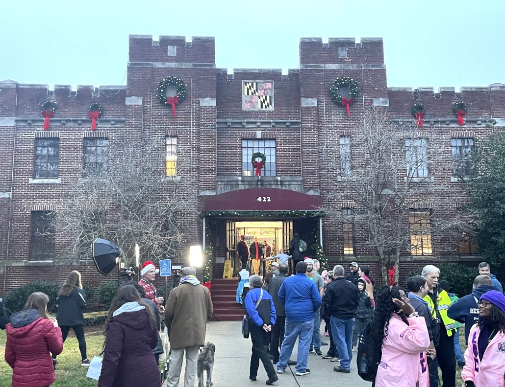 The crowd gathers on Dec. 2 in front of Laurel Armory for the lighting.
